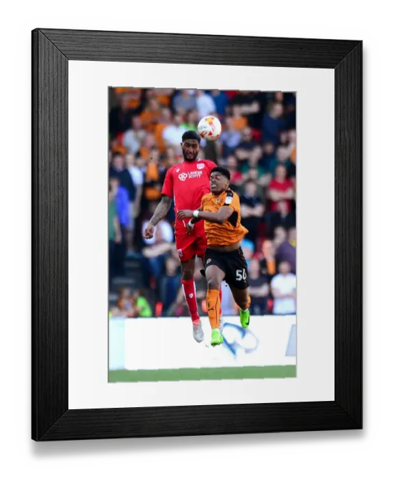 Framed Print : Intense Heading Duel: Mark Little vs. Ivan Cavaleiro at Ashton Gate