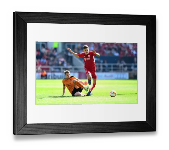 Framed Print : Pivotal Foul: Jamie Paterson vs. David Edwards in the Intense Bristol City vs. Wolverhampton Wanderers Championship Clash (April 8, 2017)