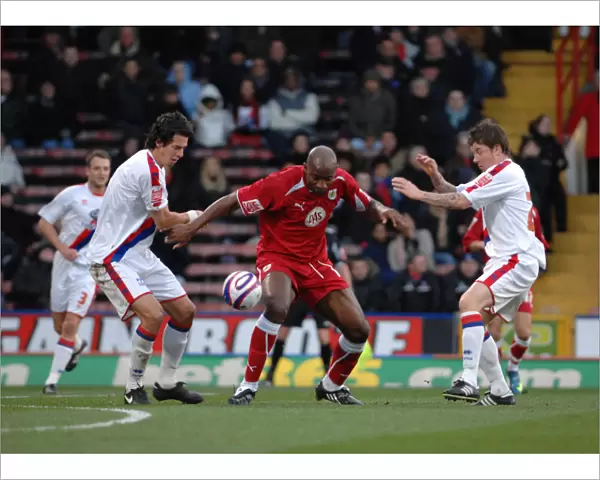 Dele Adebola fights off attention from john oster and Jose Fonte