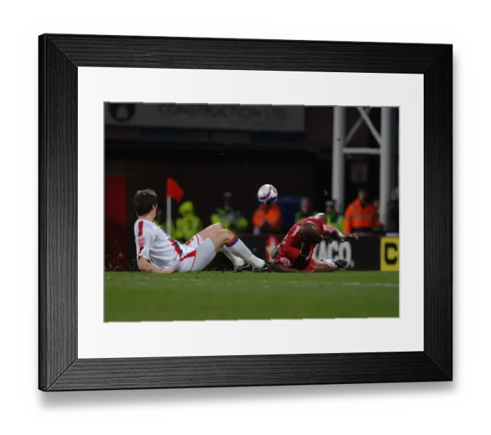 Framed Print : Dele Adebola is brought down in the box by Paddy McCarthy Framed Print : Dele Adebola is brought down in the box by Paddy McCarthy