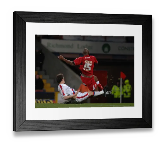 Framed Print : Dele Adebola Is brought down in the box bt Paddy McCarthy