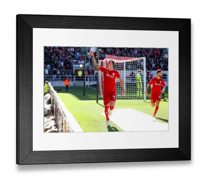 Framed Print : Dramatic Moment: Aden Flint's Game-Winning Goal for Bristol City vs Barnsley