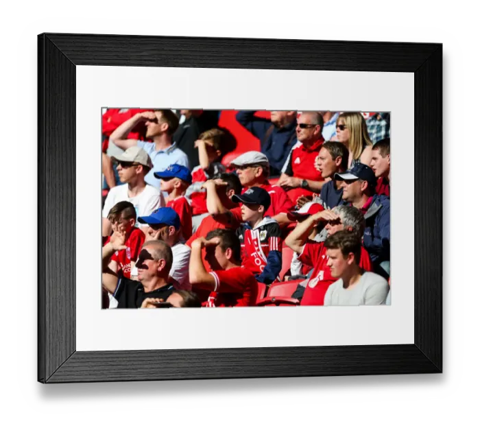 Framed Print : Bristol City Fans Watch Intently as the Action Unfolds at Ashton Gate Stadium, Sky Bet Championship Match against Barnsley Framed Print : Bristol City Fans Watch Intently as the Action Unfolds at Ashton Gate Stadium, Sky Bet Championship Match against Barnsley