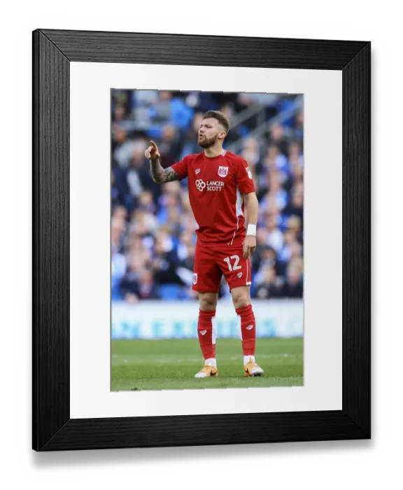 Framed Print : Bristol City's Matt Taylor Faces Off Against Brighton & Hove Albion in Championship Clash Framed Print : Bristol City's Matt Taylor Faces Off Against Brighton & Hove Albion in Championship Clash
