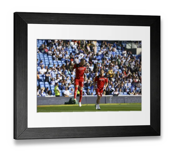 Framed Print : Championship Showdown: Intense Warm-Up Atmosphere - Brighton & Hove Albion vs. Bristol City, Amex Stadium