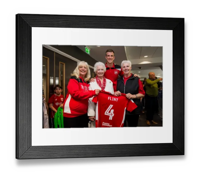 Framed Print : Aden Flint of Bristol City Presents Sponsors with Signed Shirt after Championship Match against Birmingham City