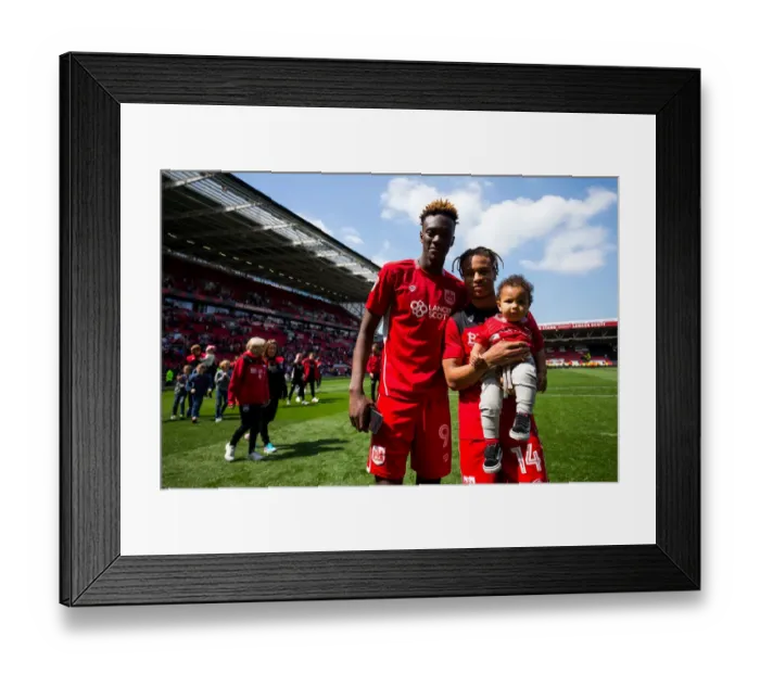 Framed Print : Bristol City Champions: Abraham and Reid Celebrate Promotion to the Premier League