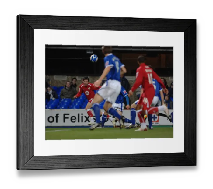Framed Print : Ivan Sproule crosses for Stern John to score
