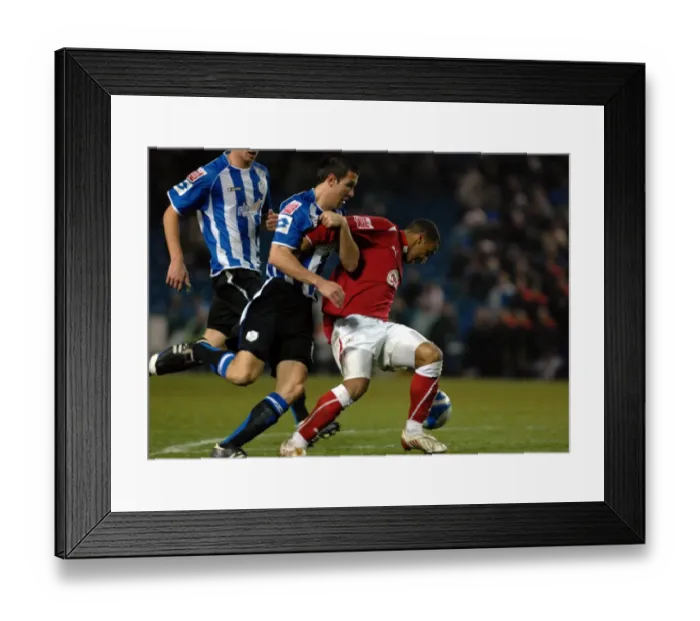 Framed Print : Nicky Maynard vs. Richard Wood: Intense Moment from Sheffield Wednesday vs. Bristol City