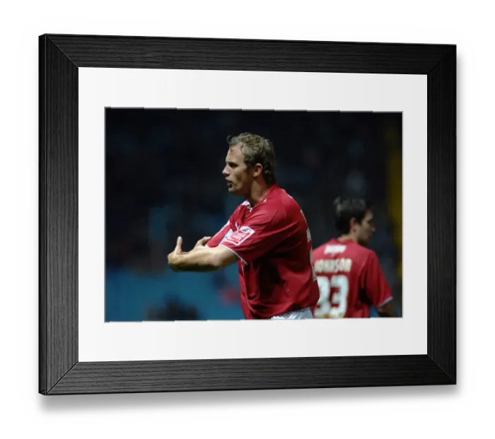 Framed Print : Lee Trundle appeals to the linesman after he appeared