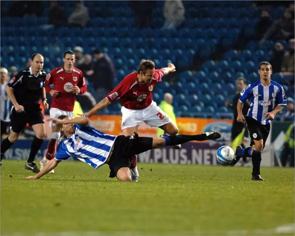 Lee Trundle battles for the ball