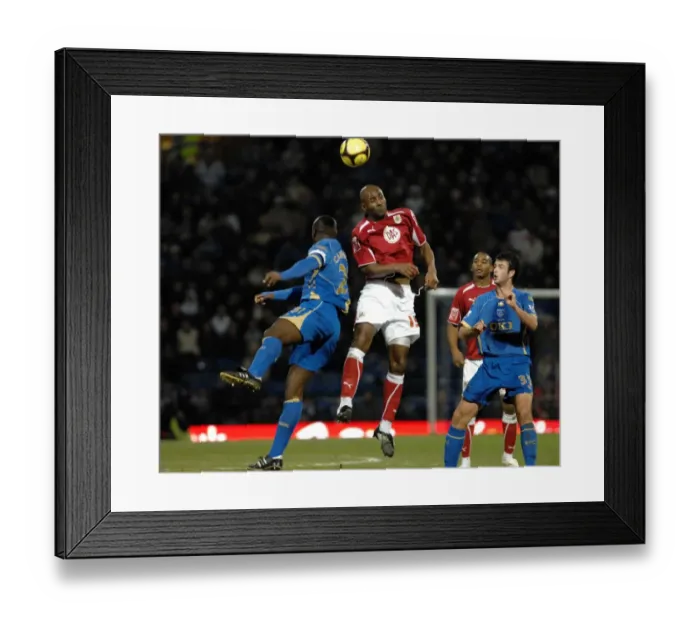 Framed Print : Dele Adebola gets above Sol Campbell