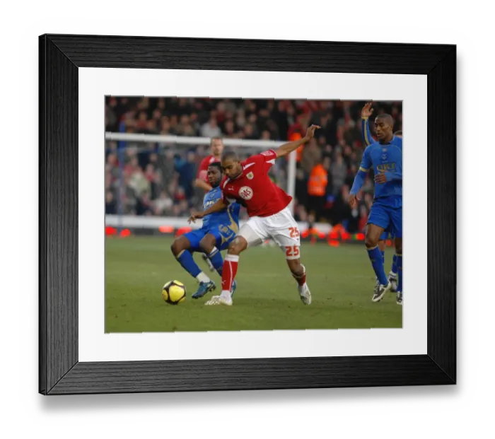Framed Print : Battling Moment: Marvin Elliott vs. Arnold Mvuemba - FA Cup Clash between Portsmouth and Bristol City Framed Print : Battling Moment: Marvin Elliott vs. Arnold Mvuemba - FA Cup Clash between Portsmouth and Bristol City