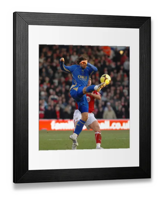 Framed Print : Niko Kranjcar flicks the ball over Bradley