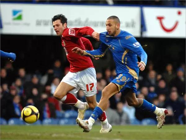 Ivan Sproule's Thrilling Escape: Dashing Past Nadir Belhadj in FA Cup Action (Portsmouth vs. Bristol City)