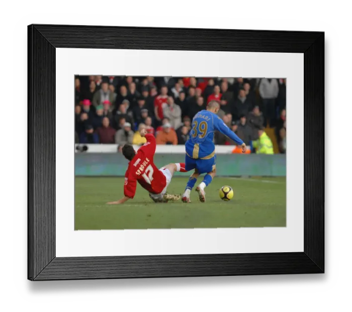 Framed Print : Ivan Sproule challenges portsmouth left back Nadir Belhadj Framed Print : Ivan Sproule challenges portsmouth left back Nadir Belhadj