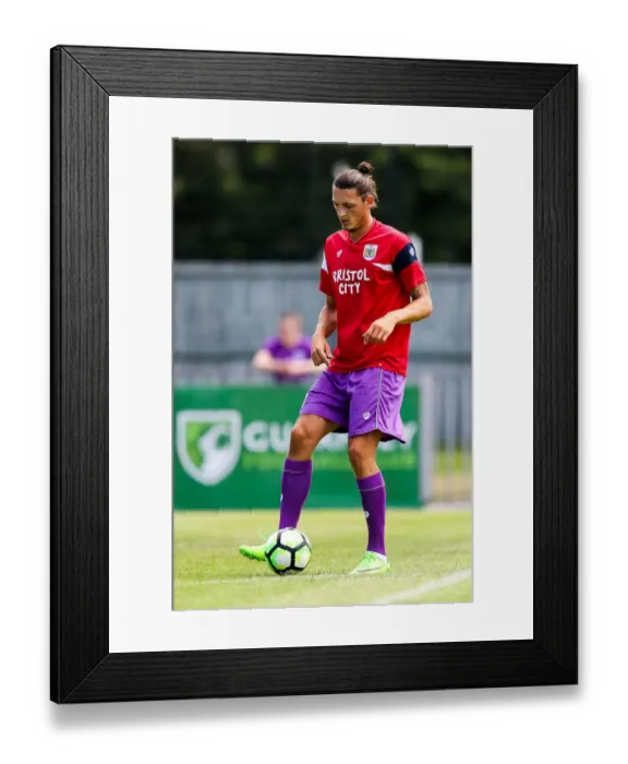 Framed Print : Bristol City FC: Milan Djuric Warming Up Ahead of Guernsey Pre-Season Friendly