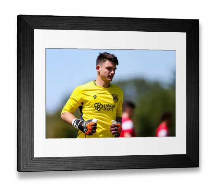 Framed Print : Max O'Leary in Action: Pre-season Friendly between Guernsey FC and Bristol City Framed Print : Max O'Leary in Action: Pre-season Friendly between Guernsey FC and Bristol City