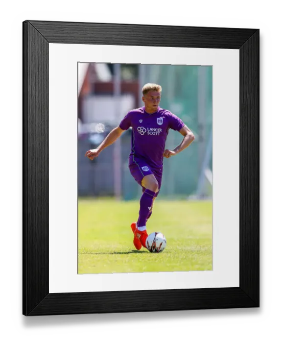 Framed Print : Bristol City's Taylor Moore in Action during Pre-season Friendly against Guernsey FC Framed Print : Bristol City's Taylor Moore in Action during Pre-season Friendly against Guernsey FC