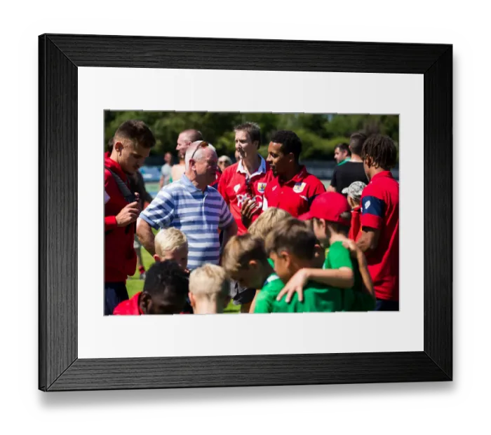 Framed Print : Bristol City's Steve Lansdown Celebrates First Pre-Season Win as Owner with Captain Korey Smith after Guernsey FC Match