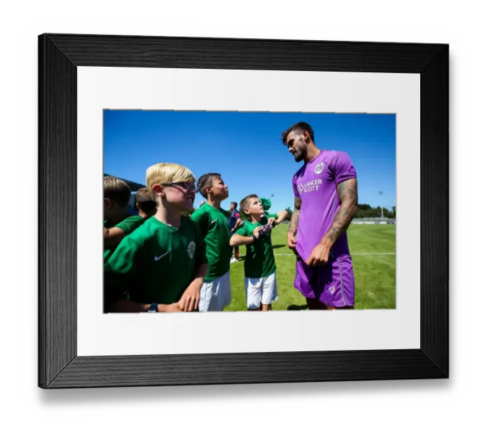 Framed Print : Marlon Pack of Bristol City Meets Young Mascots during Guernsey FC vs. Bristol City Pre-season Friendly