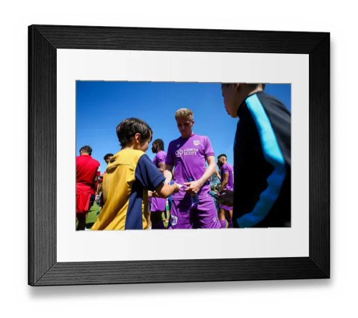 Framed Print : Bristol City's Taylor Moore Signs Autographs at Guernsey Friendly