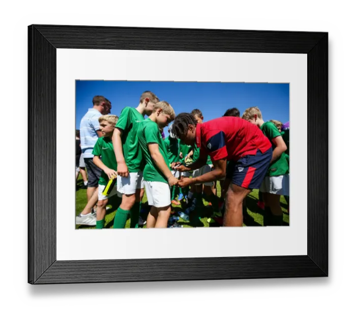 Framed Print : Bobby Reid of Bristol City Signs Autographs for Guernsey Mascots (Guernsey FC vs. Bristol City, Pre-season Friendly)