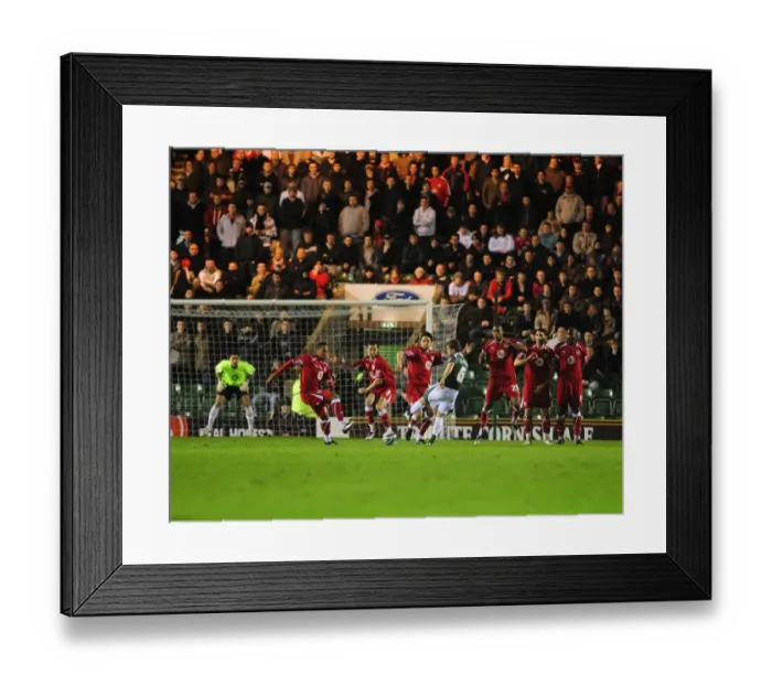 Framed Print : Intense Free-kick Showdown: Plymouth Argyle vs. Bristol City - Blocked Opportunity on the Football Field Framed Print : Intense Free-kick Showdown: Plymouth Argyle vs. Bristol City - Blocked Opportunity on the Football Field