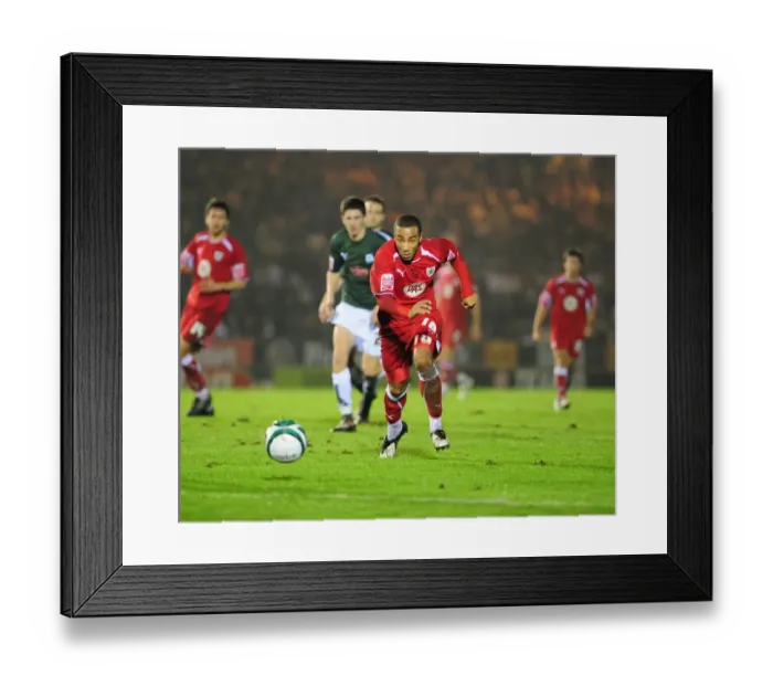 Framed Print : Nicky MAynard chases the ball Framed Print : Nicky MAynard chases the ball