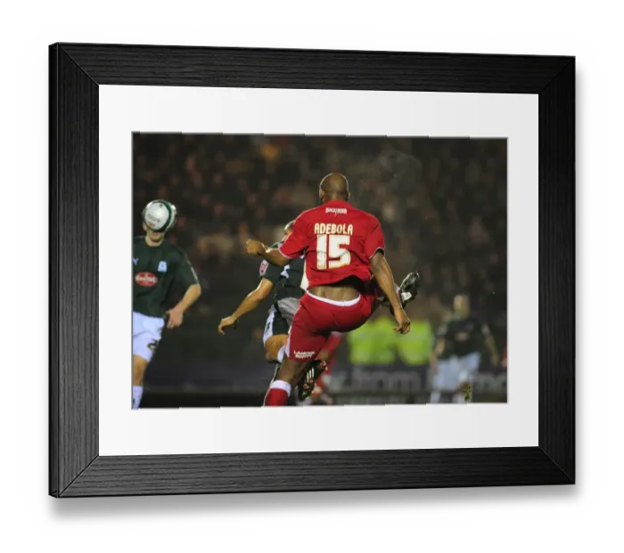Framed Print : Dele Adebola header goes just wide