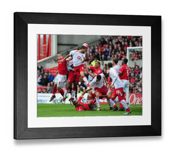 Framed Print : Liam Fontaine heads at goal Framed Print : Liam Fontaine heads at goal