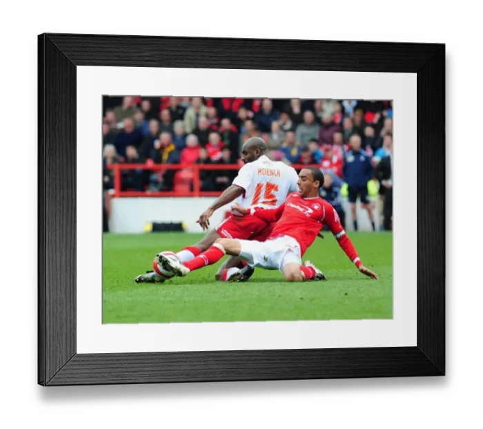 Framed Print : Dele Adebola vs. James Perch: Intense Rivalry on the Football Field Framed Print : Dele Adebola vs. James Perch: Intense Rivalry on the Football Field