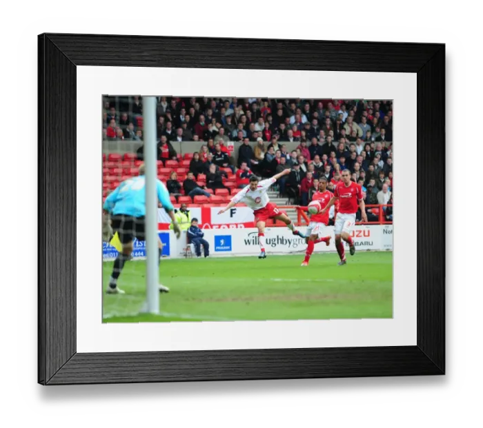 Framed Print : Ivan Sproule crosses the ball