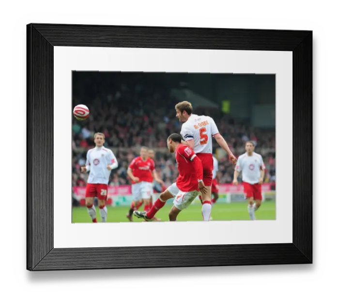 Framed Print : Jamie McCombe flicks the ball on