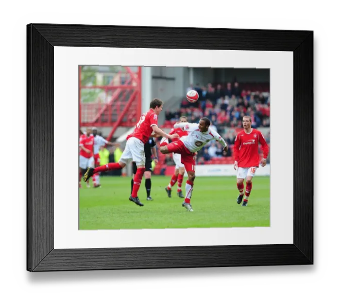 Framed Print : Nicky Maynarrd battles for the ball with