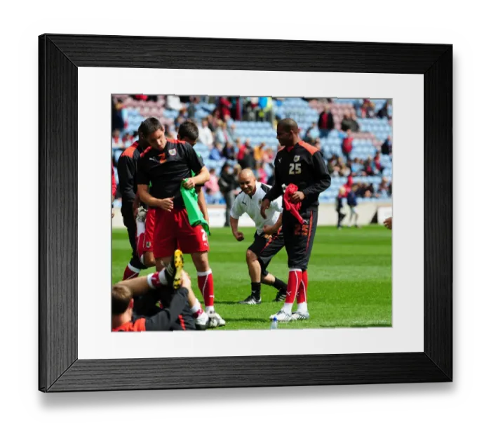 Framed Print : City players warm up