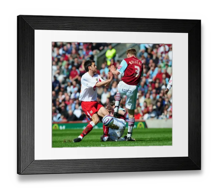 Framed Print : Cole Skuse tackles Christian Kalvenes