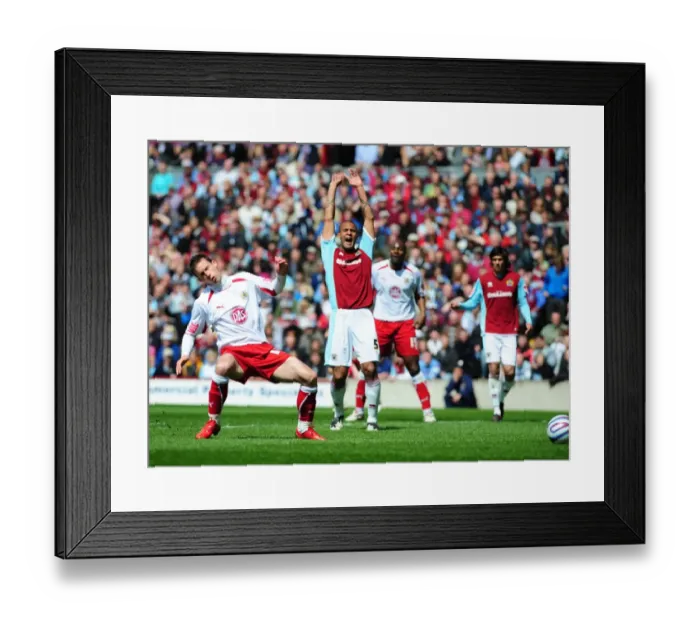 Framed Print : Michael McIndoe shoots whilst Clarke Carlisle appeals for offside Framed Print : Michael McIndoe shoots whilst Clarke Carlisle appeals for offside