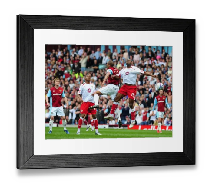 Framed Print : Dele Adebola gets a flick on