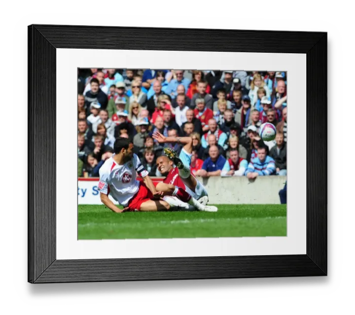 Framed Print : Liam Fontaine fouls Clarke Carlisle Framed Print : Liam Fontaine fouls Clarke Carlisle