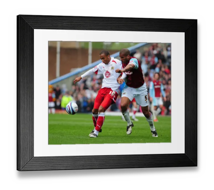 Framed Print : Nicky Maynard and Clarke Carlisle: A Rivalry Unfolds - Burnley vs. Bristol City Framed Print : Nicky Maynard and Clarke Carlisle: A Rivalry Unfolds - Burnley vs. Bristol City