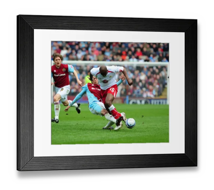 Framed Print : Dele Adebola is tackled by Rhys Williams