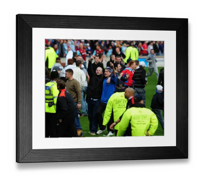 Framed Print : Burnley Fans Invade the Pitch: A Moment from the Burnley vs. Bristol City Match