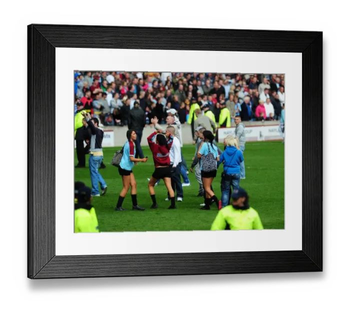 Framed Print : Burnley fans on the pitch Framed Print : Burnley fans on the pitch