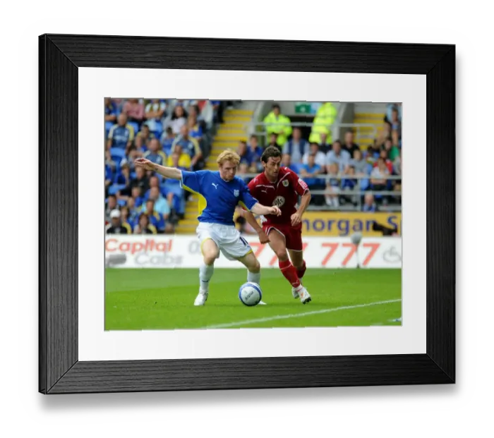 Framed Print : Season 09-10: A Football Rivalry - The Intense Battle on the Field: Cardiff City vs. Bristol City