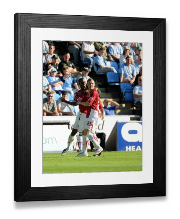 Framed Print : Liam Fontaine and Brian Wilson smother Nicky Maynard after his equalizer Framed Print : Liam Fontaine and Brian Wilson smother Nicky Maynard after his equalizer