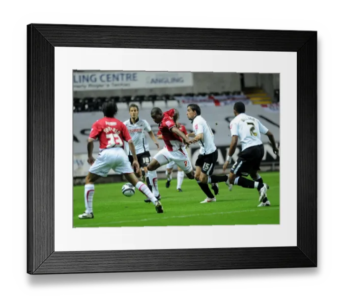 Framed Print : Marvin Elliott gets away from Jordi Lopez Framed Print : Marvin Elliott gets away from Jordi Lopez
