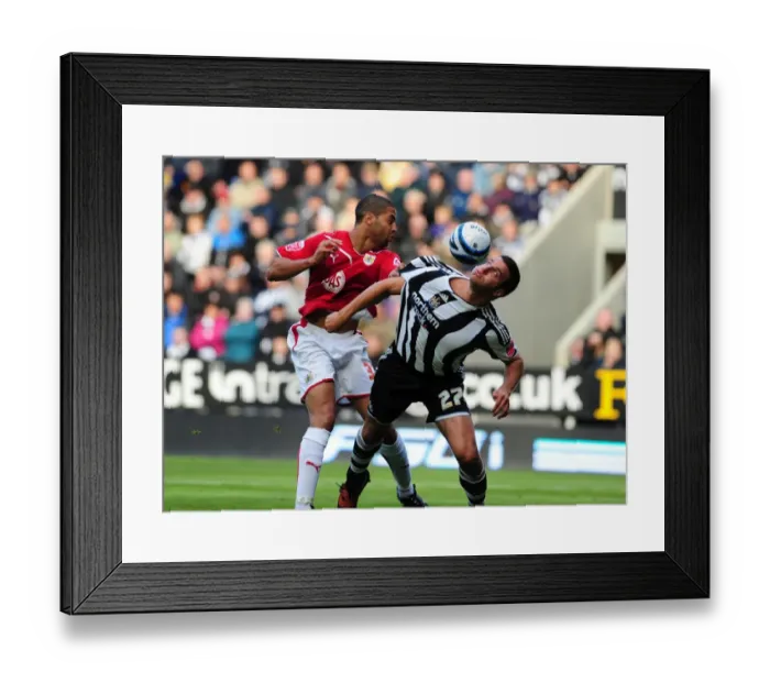 Framed Print : Saborio vs. Taylor: Intense Moment from Newcastle United vs. Bristol City Football Match Framed Print : Saborio vs. Taylor: Intense Moment from Newcastle United vs. Bristol City Football Match