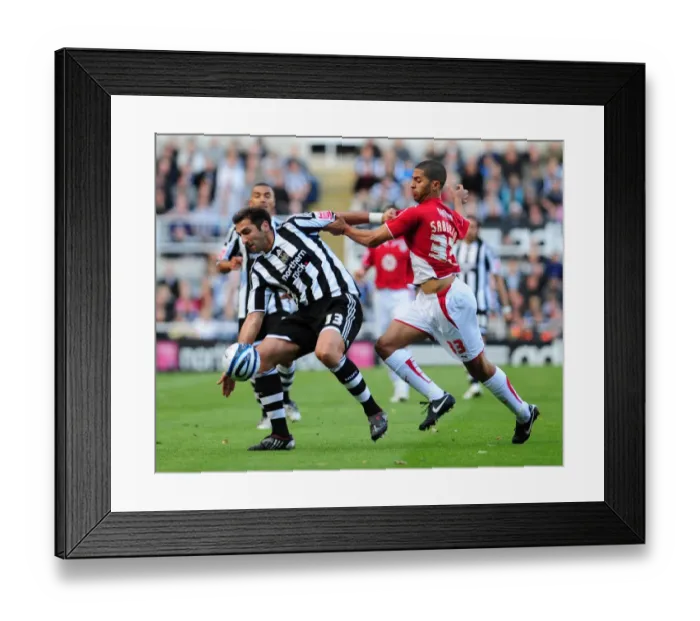 Framed Print : Powerful Duo: Khizanishvili and Saborio in Action - Newcastle United vs. Bristol City Framed Print : Powerful Duo: Khizanishvili and Saborio in Action - Newcastle United vs. Bristol City