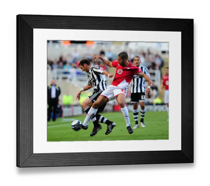 Framed Print : Clash of Stars: Zurab Khizanishvili vs. Alvaro Saborio in Newcastle Utd vs. Bristol City Framed Print : Clash of Stars: Zurab Khizanishvili vs. Alvaro Saborio in Newcastle Utd vs. Bristol City